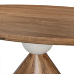 A sculptural showstopper inspired by Italian design. Finished in smoked honey, a cone-tapered parawood base supports an oval tabletop separated by white-finished marble detailing.As lovers of clean aesthetics at Amethyst, we love the nature inspired Bibianna Oval Dining Table - Honed White Marble - Smoked Honey. Amethyst Home provides interior design, new home construction design consulting, vintage area rugs, and lighting in the Laguna Beach metro area.