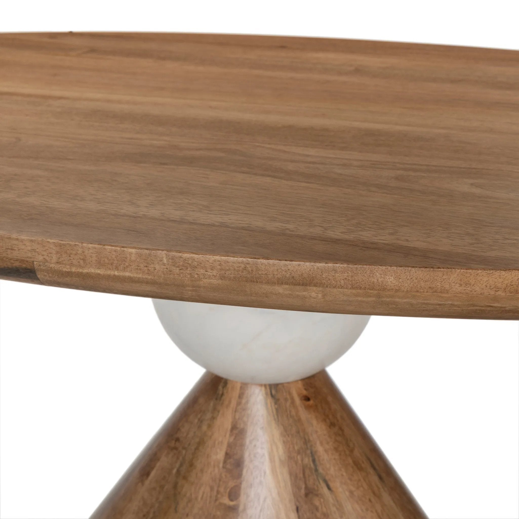 A sculptural showstopper inspired by Italian design. Finished in smoked honey, a cone-tapered parawood base supports an oval tabletop separated by white-finished marble detailing.As lovers of clean aesthetics at Amethyst, we love the nature inspired Bibianna Oval Dining Table - Honed White Marble - Smoked Honey. Amethyst Home provides interior design, new home construction design consulting, vintage area rugs, and lighting in the Laguna Beach metro area.