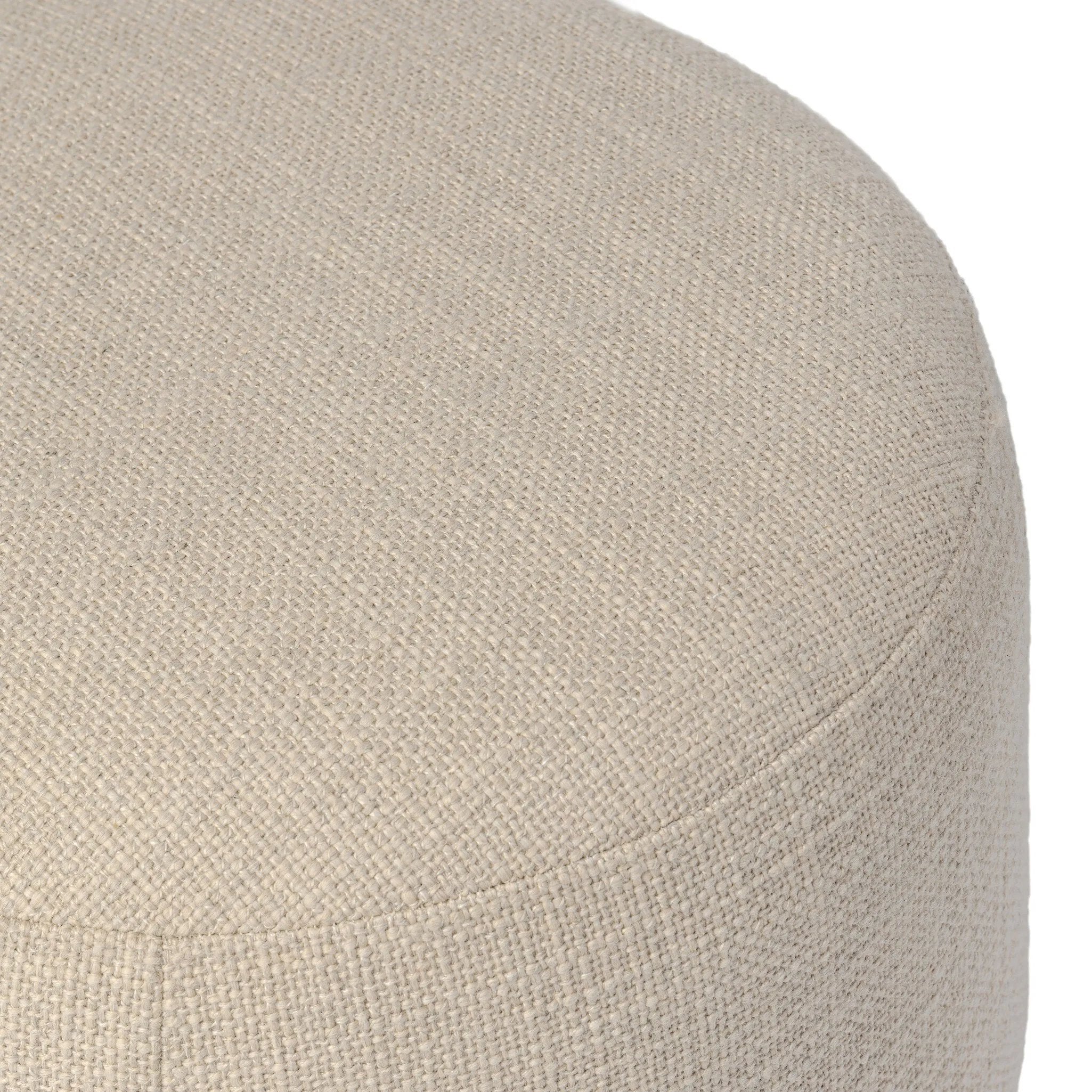 Featuring Bilbury Saxon Sand Ottoman by Four Hands at Amethyst Home. For an extra seat or propped feet, this welcoming ottoman features a subtly tapered shape and a rounded base with oak bun feet beneath. Crafted with soft foam cushioning and upholstered in a poly/wool blend fabric. Overall Dimensions: 22.00"w x 22.00"d x 18.50"h. Amethyst Home provides interior design, new home construction design consulting, vintage area rugs, and lighting in the Winter Garden metro area.