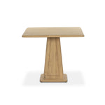 A squared shape and smaller scale makes this bistro-style table perfect for intimate spaces. Made from solid oak with a beautifully light finish, a tapered base and softened bullnose edges reflect a traditional look that works into any space with ease. Amethyst Home provides interior design, new home construction design consulting, vintage area rugs, and lighting in the Salt Lake City metro area.