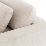 Deep, modern and seductive. This dramatic, spacious sofa is covered in a durable light neutral woven fabric that mixes well with any color palette Amethyst Home provides interior design, new home construction design consulting, vintage area rugs, and lighting in the Nashville metro area.