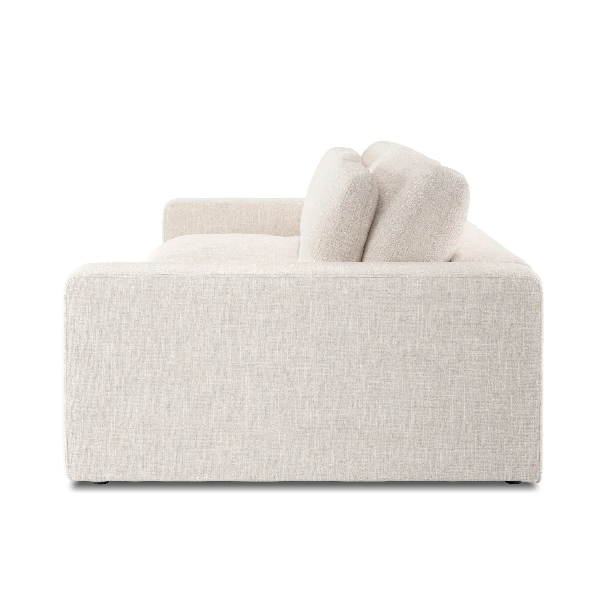 Deep, modern and seductive. This dramatic, spacious sofa is covered in a durable light neutral woven fabric that mixes well with any color palette Amethyst Home provides interior design, new home construction design consulting, vintage area rugs, and lighting in the Park City metro area.