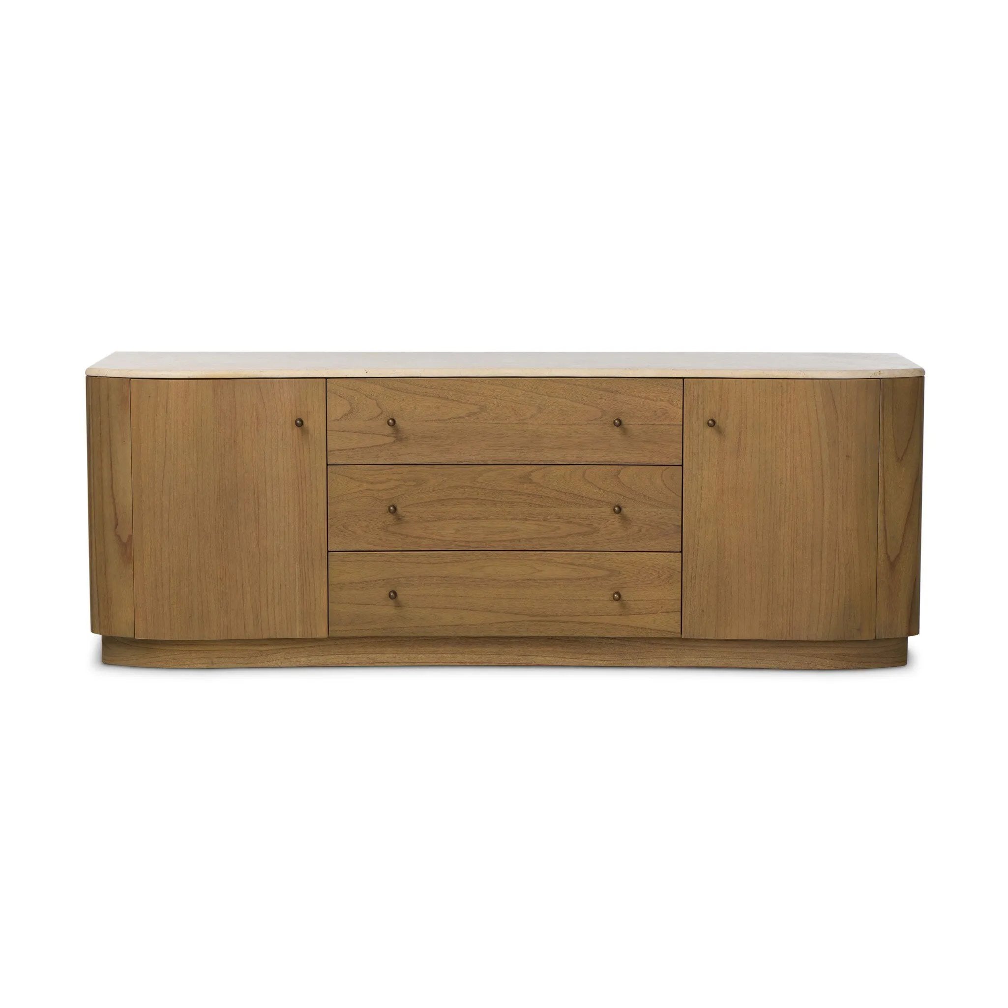 Fluid contours give shape to this solid mindi media console, topped with a creamy marbled top. Two doors with knobbed pulls and three drawers open to spacious storage Amethyst Home provides interior design, new home construction design consulting, vintage area rugs, and lighting in the Miami metro area.