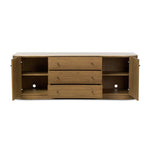 Fluid contours give shape to this solid mindi media console, topped with a creamy marbled top. Two doors with knobbed pulls and three drawers open to spacious storage Amethyst Home provides interior design, new home construction design consulting, vintage area rugs, and lighting in the Washington metro area.