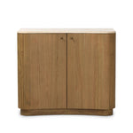 Fluid contours give shape to this solid mindi cabinet, topped with a creamy marbled top. Two doors with knobbed pulls open to inset shelves for organized storage Amethyst Home provides interior design, new home construction design consulting, vintage area rugs, and lighting in the Monterey metro area.