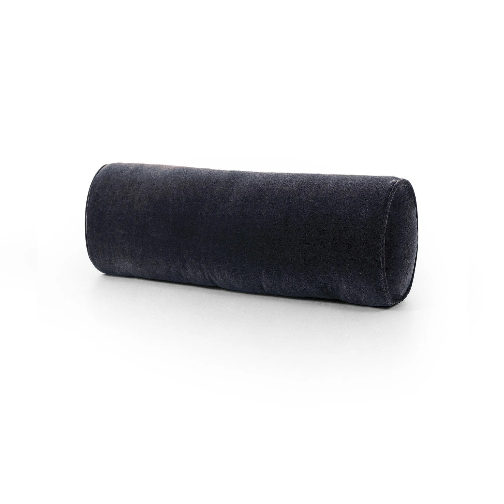 A long, navy-colored bolster pillow elevates beds and sofas in an instant. Crafted from saturated wool velvet, for a sustainable alternative to mohair, with a hidden zipper for a smooth silhouette.As lovers of wabi sabi aesthetics at Amethyst, we love the warm modern inspired Bridger Bolster Pillow - Monte Navy. Amethyst Home provides interior design, new home construction design consulting, vintage area rugs, and lighting in the Charlotte metro area.