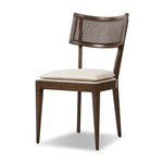 Featuring Britt Savile Flax Dining Chair by Four Hands at Amethyst Home. Mixed materials refresh retro dining style. Ebony-finished nettlewood frames a textural inlay of natural cane, for perfect contrast. Fastened by Velcro, high-performance linen-blend seating for modern sensibility. Performance fabrics are specially created to withstand spills, stains, high. Amethyst Home provides interior design, new home construction design consulting, vintage area rugs, and lighting in the Dallas metro area.