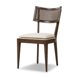 Featuring Britt Savile Flax Dining Chair by Four Hands at Amethyst Home. Mixed materials refresh retro dining style. Ebony-finished nettlewood frames a textural inlay of natural cane, for perfect contrast. Fastened by Velcro, high-performance linen-blend seating for modern sensibility. Performance fabrics are specially created to withstand spills, stains, high. Amethyst Home provides interior design, new home construction design consulting, vintage area rugs, and lighting in the Dallas metro area.