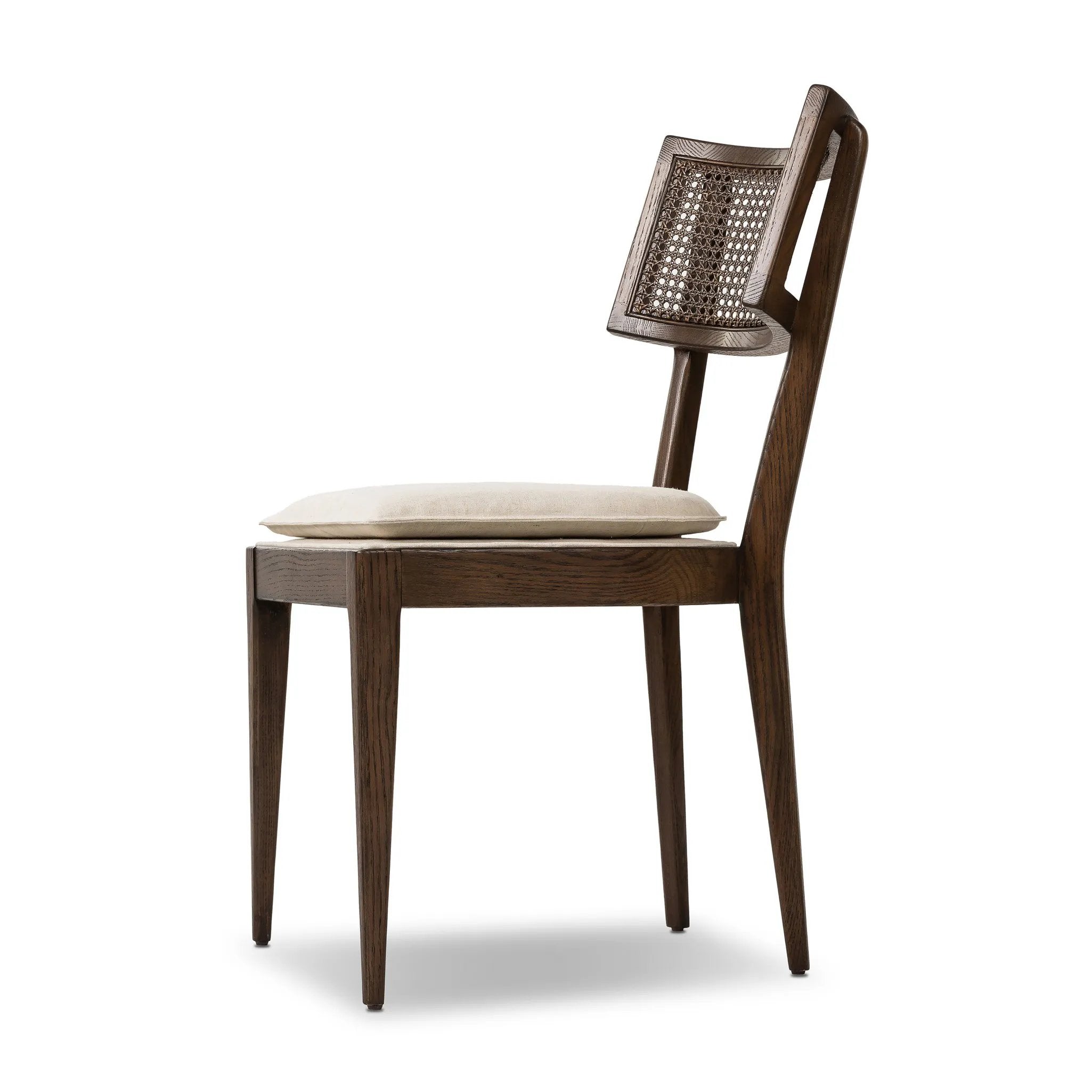 Featuring Britt Savile Flax Dining Chair by Four Hands at Amethyst Home. Mixed materials refresh retro dining style. Ebony-finished nettlewood frames a textural inlay of natural cane, for perfect contrast. Fastened by Velcro, high-performance linen-blend seating for modern sensibility. Performance fabrics are specially created to withstand spills, stains, . Amethyst Home provides interior design, new home construction design consulting, vintage area rugs, and lighting in the Des Moines metro area.