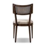 Featuring Britt Savile Flax Dining Chair by Four Hands at Amethyst Home. Mixed materials refresh retro dining style. Ebony-finished nettlewood frames a textural inlay of natural cane, for perfect contrast. Fastened by Velcro, high-performance linen-blend seating for modern sensibility. Performance fabrics are specially created to withstand spills, stains, h. Amethyst Home provides interior design, new home construction design consulting, vintage area rugs, and lighting in the San Diego metro area.