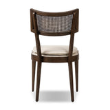 Featuring Britt Savile Flax Dining Chair by Four Hands at Amethyst Home. Mixed materials refresh retro dining style. Ebony-finished nettlewood frames a textural inlay of natural cane, for perfect contrast. Fastened by Velcro, high-performance linen-blend seating for modern sensibility. Performance fabrics are specially created to withstand spills, stains, h. Amethyst Home provides interior design, new home construction design consulting, vintage area rugs, and lighting in the San Diego metro area.
