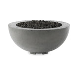 This outdoor fire table is a welcoming centerpiece designed for gathering. Made from glass-reinforced concrete, each piece is naturally finished with deep tones of pewter and dark grey. The bowl shape is completed with lavastones in the center, bringing together a bold, monochromatic look. Amethyst Home provides interior design, new home construction design consulting, vintage area rugs, and lighting in the Calabasas metro area.