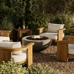 This outdoor fire table is a welcoming centerpiece designed for gathering. Made from glass-reinforced concrete, each piece is naturally finished with deep tones of pewter and dark grey. The bowl shape is completed with lavastones in the center, bringing together a bold, monochromatic look. Amethyst Home provides interior design, new home construction design consulting, vintage area rugs, and lighting in the Park City metro area.