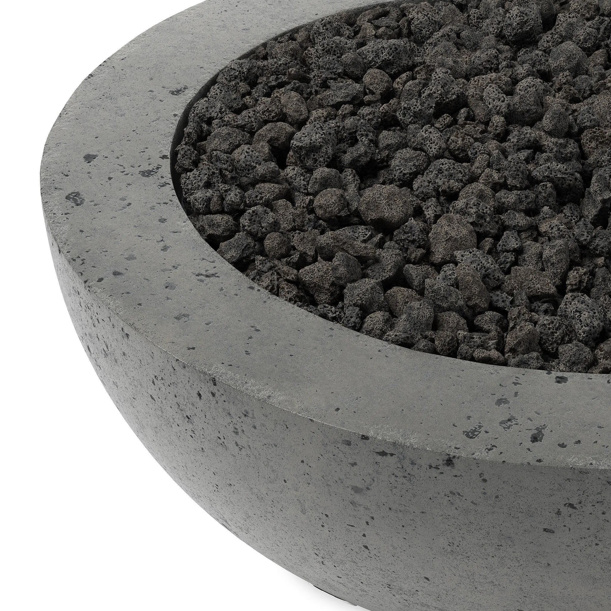 This outdoor fire table is a welcoming centerpiece designed for gathering. Made from glass-reinforced concrete, each piece is naturally finished with deep tones of pewter and dark grey. The bowl shape is completed with lavastones in the center, bringing together a bold, monochromatic look. Amethyst Home provides interior design, new home construction design consulting, vintage area rugs, and lighting in the Salt Lake City metro area.