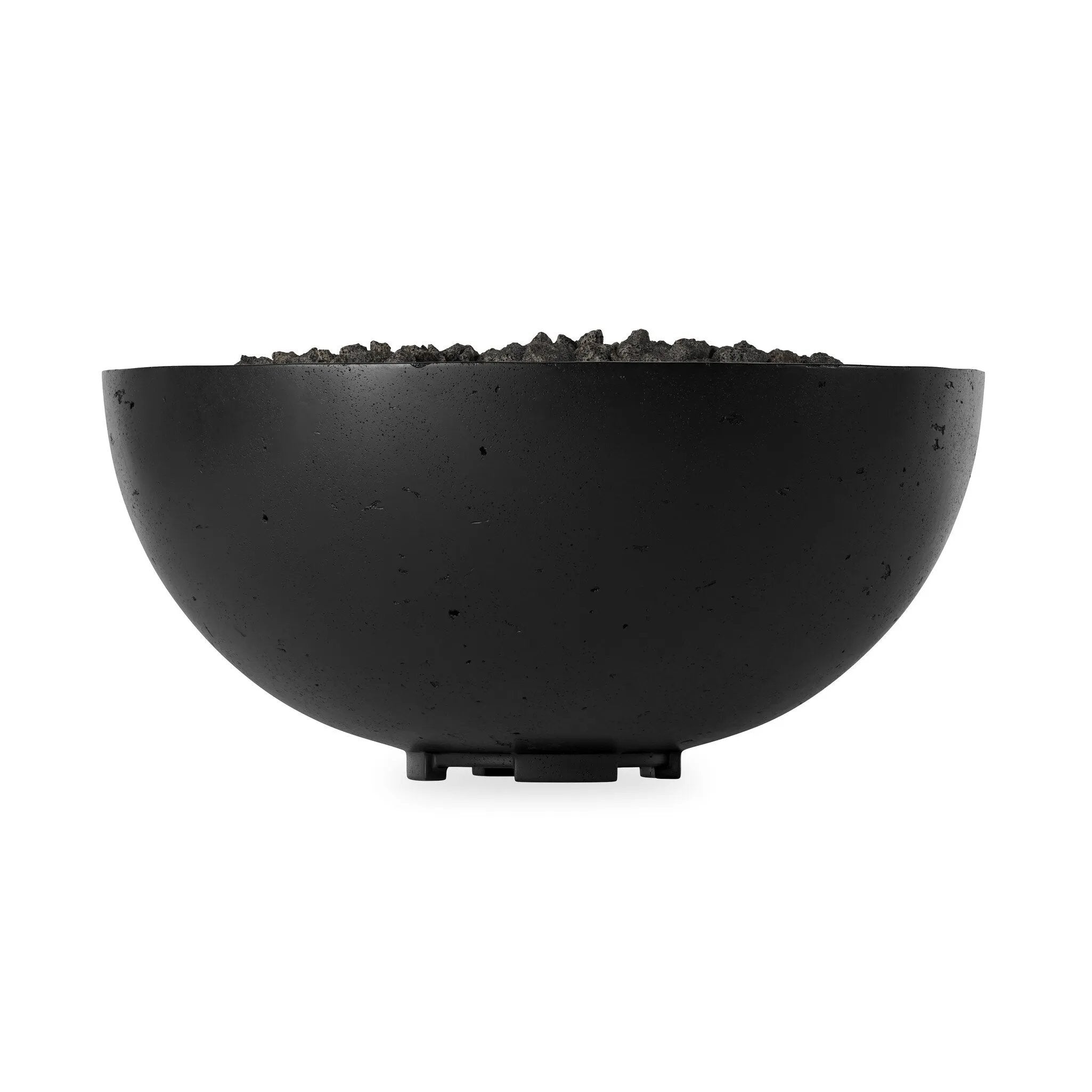 This outdoor fire table is a welcoming centerpiece designed for gathering. Made from glass-reinforced concrete, each piece is naturally finished with deep tones of charcoal. The bowl shape is completed with lavastones in the center, bringing together a bold, monochromatic look. Professional installation required to connect to a natural gas line. Amethyst Home provides interior design, new home construction design consulting, vintage area rugs, and lighting in the Salt Lake City metro area.