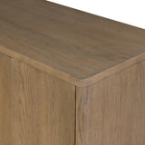 The classic wooden cabinet, reimagined. This warm oak piece features double doors with shallow scalloping that draws the eye, providing a subtle visual flow.As lovers of wabi sabi design at Amethyst, we love the designer inspired Brookhurst Small Cabinet - Drifted Oak Veneer. Amethyst Home provides interior design, new home construction design consulting, vintage area rugs, and lighting in the Omaha metro area.