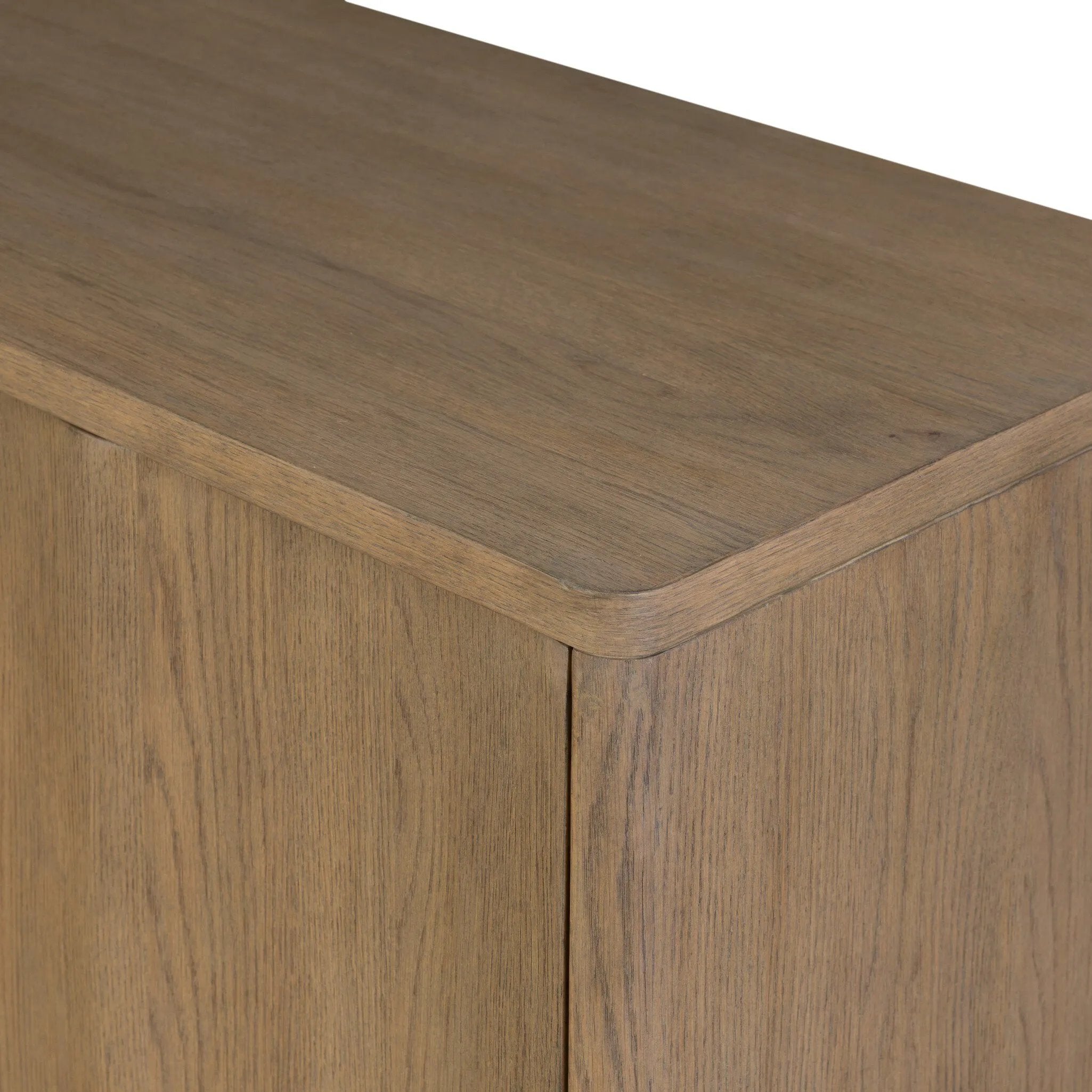 The classic wooden cabinet, reimagined. This warm oak piece features double doors with shallow scalloping that draws the eye, providing a subtle visual flow.As lovers of wabi sabi design at Amethyst, we love the designer inspired Brookhurst Small Cabinet - Drifted Oak Veneer. Amethyst Home provides interior design, new home construction design consulting, vintage area rugs, and lighting in the Omaha metro area.