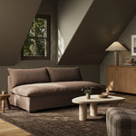 Welcome to the modern lounging essential. The sofa piece to a simplified sectional is upholstered in a soft, high-performance fabric in an inviting coffee hue. Performance fabrics are specially created to withstand spills, stains, high traffic and wear, ensuring long-term comfort and unmatched durability Amethyst Home provides interior design, new home construction design consulting, vintage area rugs, and lighting in the Alpharetta metro area.