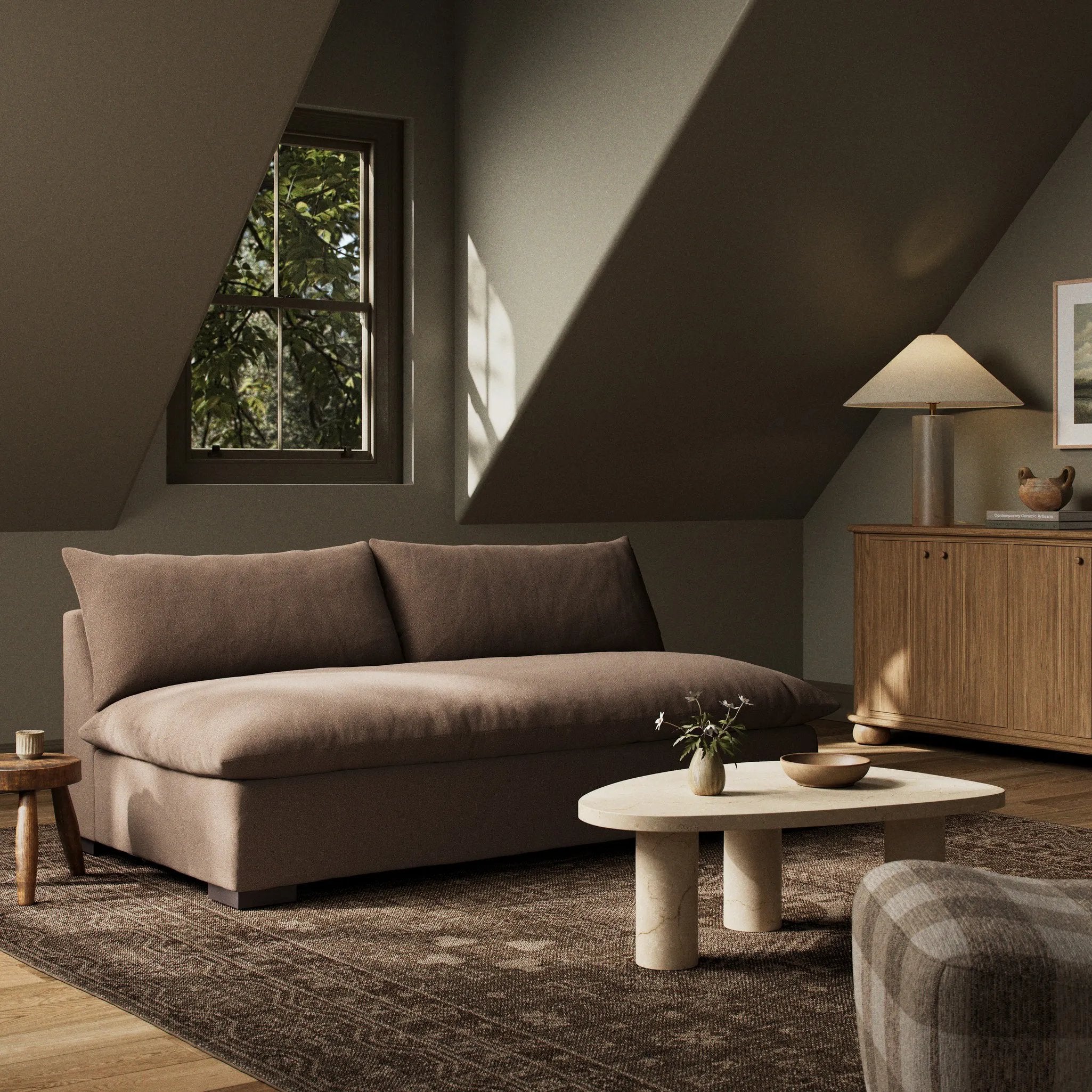 Welcome to the modern lounging essential. The sofa piece to a simplified sectional is upholstered in a soft, high-performance fabric in an inviting coffee hue. Performance fabrics are specially created to withstand spills, stains, high traffic and wear, ensuring long-term comfort and unmatched durability Amethyst Home provides interior design, new home construction design consulting, vintage area rugs, and lighting in the Alpharetta metro area.