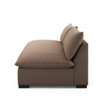 Welcome to the modern lounging essential. The sofa piece to a simplified sectional is upholstered in a soft, high-performance fabric in an inviting coffee hue. Performance fabrics are specially created to withstand spills, stains, high traffic and wear, ensuring long-term comfort and unmatched durability Amethyst Home provides interior design, new home construction design consulting, vintage area rugs, and lighting in the Winter Garden metro area.