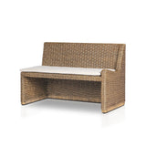 Antique-inspired coastal style. Rattan introduces varying natural shades and texture to this dining bench, and the frame's soft lines and fabric cushion invite a comfortable sit. Option to style alone or pair with other pieces in the collection. A design collaboration by Amber Lewis and Four Hands. Winner of the Domino Good Design Awards 2024. Amethyst Home provides interior design, new home construction design consulting, vintage area rugs, and lighting in the Park City metro area.