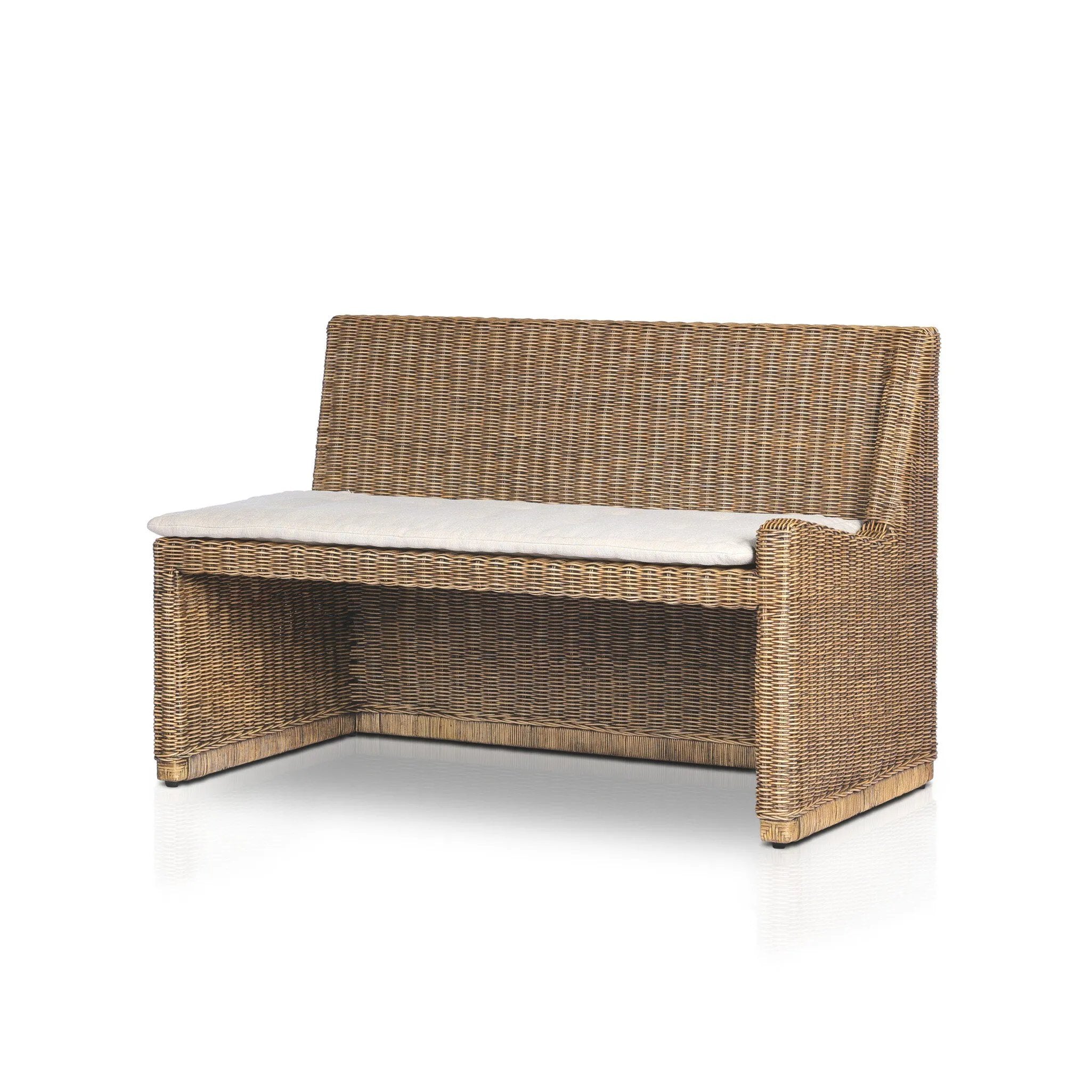 Antique-inspired coastal style. Rattan introduces varying natural shades and texture to this dining bench, and the frame's soft lines and fabric cushion invite a comfortable sit. Option to style alone or pair with other pieces in the collection. A design collaboration by Amber Lewis and Four Hands. Winner of the Domino Good Design Awards 2024. Amethyst Home provides interior design, new home construction design consulting, vintage area rugs, and lighting in the Park City metro area.