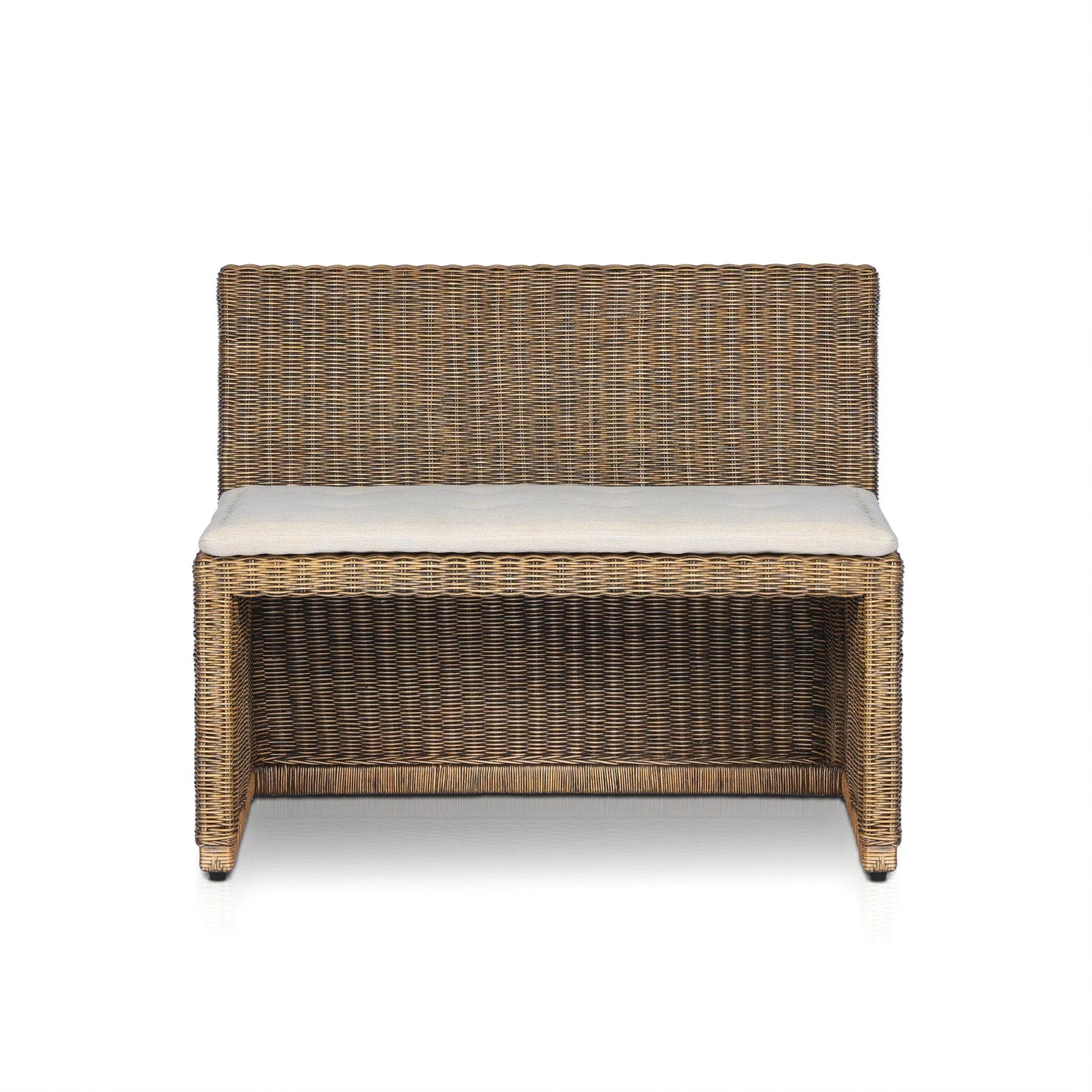 Antique-inspired coastal style. Rattan introduces varying natural shades and texture to this dining bench, and the frame's soft lines and fabric cushion invite a comfortable sit. Option to style alone or pair with other pieces in the collection. A design collaboration by Amber Lewis and Four Hands. Winner of the Domino Good Design Awards 2024. Amethyst Home provides interior design, new home construction design consulting, vintage area rugs, and lighting in the Tampa metro area.