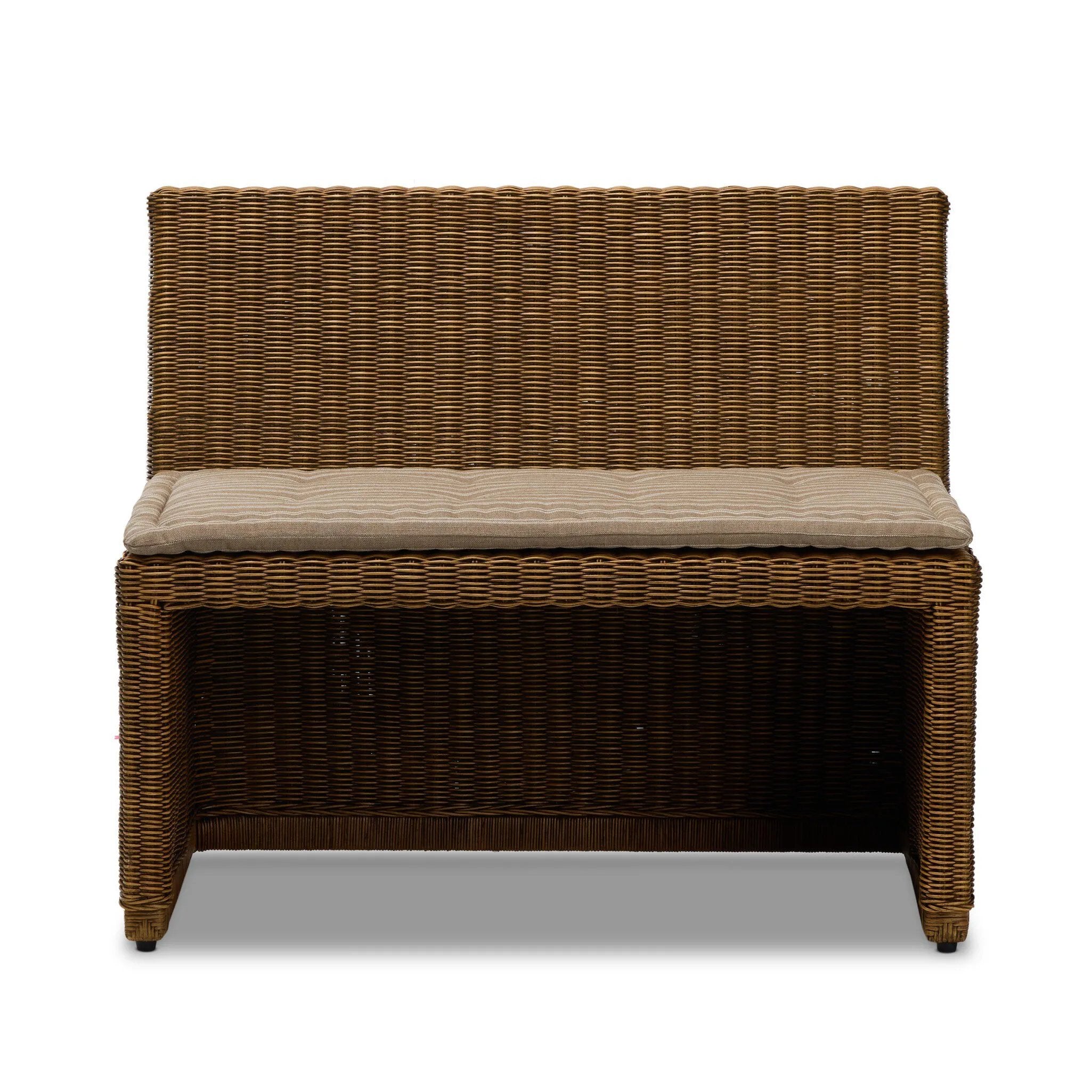 Antique-inspired coastal style. Rattan introduces varying natural shades and texture to this dining bench, and the frame's soft lines and beige and white striped fabric cushion invite a comfortable sit. Option to style alone or pair with other pieces in the collection. A design collaboration by Amber Lewis and Four Hands. Amethyst Home provides interior design, new home construction design consulting, vintage area rugs, and lighting in the Portland metro area.