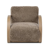 Soft texture and eye-catching contours fuse in this comfort-driven accent chair, pairing a low, luxurious shearling seat and dramatic bent wood frame Amethyst Home provides interior design, new home construction design consulting, vintage area rugs, and lighting in the Boston metro area.