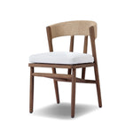Featuring Buxton Arashi Salt Outdoor Dining Chair by Four Hands at Amethyst Home. The traditional whistler chair, reimagined for the great outdoors. Crafted from FSC®-certified teak, tapered legs extend to a woven back of faux hyacinth, complete with a soft, durable seat cushion. Cover or store indoors during inclement weather and when not in use. Overall Di. Amethyst Home provides interior design, new home construction design consulting, vintage area rugs, and lighting in the Portland metro area.