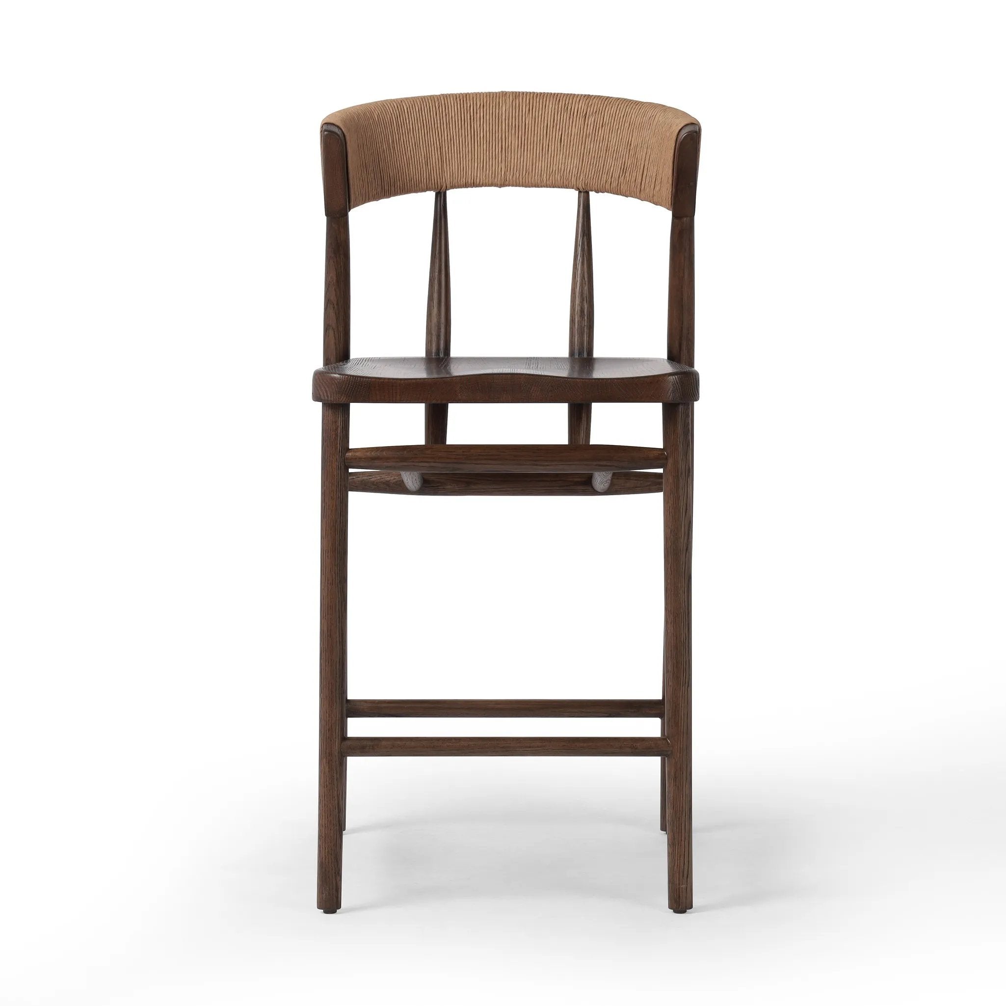 A solid oak counter stool defined by tapered legs and framing gives an updated look to the classic whistler chair. Finished with a paper rush wrapped detail on the back Amethyst Home provides interior design, new home construction design consulting, vintage area rugs, and lighting in the Winter Garden metro area.