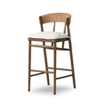 Featuring Buxton Savile Flax Bar + Counter Stool by Four Hands at Amethyst Home. A solid oak counter stool defined by tapered legs and framing gives an updated look to the classic whistler chair. Finished with a paper rush wrapped detail on the back.BarOverall Dimensions: 19.25"w x 22.25"d x 42.75"hWeight: 23.70 lbsCounterOverall Dimensions: 19.50"w x 22.25"d x. Amethyst Home provides interior design, new home construction design consulting, vintage area rugs, and lighting in the Miami metro area.