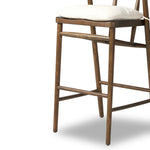 Featuring Buxton Savile Flax Bar + Counter Stool by Four Hands at Amethyst Home. A solid oak counter stool defined by tapered legs and framing gives an updated look to the classic whistler chair. Finished with a paper rush wrapped detail on the back.BarOverall Dimensions: 19.25"w x 22.25"d x 42.75"hWeight: 23.70 lbsCounterOverall Dimensions: 19.50"w x 22.25"d. Amethyst Home provides interior design, new home construction design consulting, vintage area rugs, and lighting in the Seattle metro area.