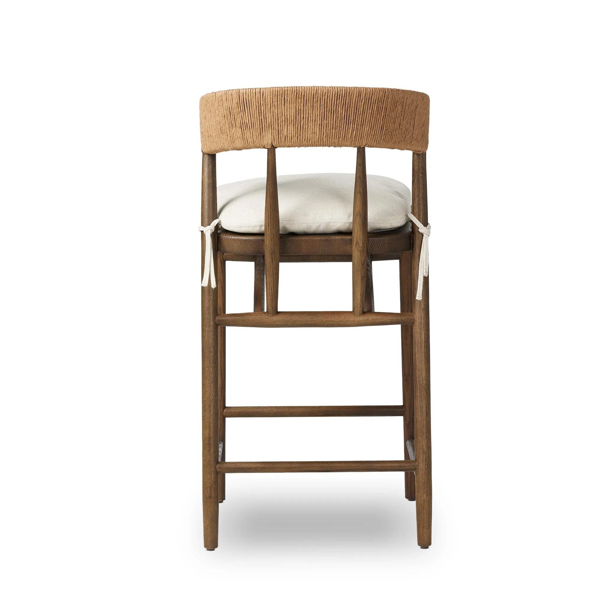 Featuring Buxton Savile Flax Bar + Counter Stool by Four Hands at Amethyst Home. A solid oak counter stool defined by tapered legs and framing gives an updated look to the classic whistler chair. Finished with a paper rush wrapped detail on the back.BarOverall Dimensions: 19.25"w x 22.25"d x 42.75"hWeight: 23.70 lbsCounterOverall Dimensions: 19.50"w x 22.2. Amethyst Home provides interior design, new home construction design consulting, vintage area rugs, and lighting in the Washington metro area.