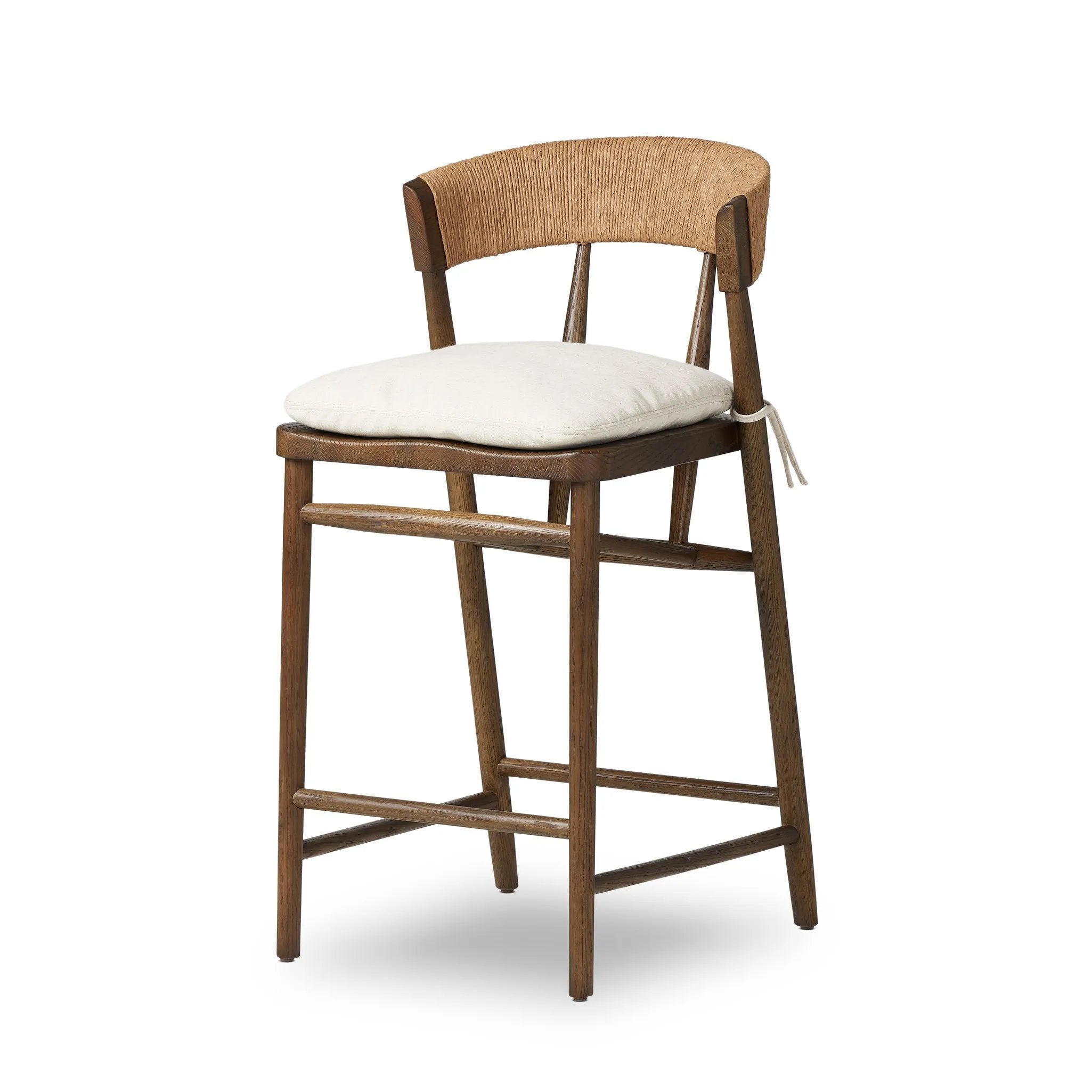 A solid oak counter stool defined by tapered legs and framing gives an updated look to the classic whistler chair. Finished with a paper rush wrapped detail on the back Amethyst Home provides interior design, new home construction design consulting, vintage area rugs, and lighting in the Winter Garden metro area.