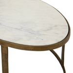 Featuring Calder Polished White Marble Nesting Coffee Table by Four Hands at Amethyst Home. Shapely surfaces, designed to slide together or apart with ease. A raw brass finish lends a lived-in feel to aluminum framing, with one oval-shaped nester topped by polished white marble pairing with a taller, rounded table featuring tempered glass.    Large Table: 38.0. Amethyst Home provides interior design, new home construction design consulting, vintage area rugs, and lighting in the Austin metro area.