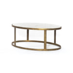 Featuring Calder Polished White Marble Nesting Coffee Table by Four Hands at Amethyst Home. Shapely surfaces, designed to slide together or apart with ease. A raw brass finish lends a lived-in feel to aluminum framing, with one oval-shaped nester topped by polished white marble pairing with a taller, rounded table featuring tempered glass.    Large Table:. Amethyst Home provides interior design, new home construction design consulting, vintage area rugs, and lighting in the Kansas City metro area.