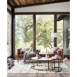 Featuring Calder Polished White Marble Nesting Coffee Table by Four Hands at Amethyst Home. Shapely surfaces, designed to slide together or apart with ease. A raw brass finish lends a lived-in feel to aluminum framing, with one oval-shaped nester topped by polished white marble pairing with a taller, rounded table featuring tempered glass.    Large Table. Amethyst Home provides interior design, new home construction design consulting, vintage area rugs, and lighting in the Laguna Beach metro area.
