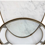 Featuring Calder Polished White Marble Nesting Coffee Table by Four Hands at Amethyst Home. Shapely surfaces, designed to slide together or apart with ease. A raw brass finish lends a lived-in feel to aluminum framing, with one oval-shaped nester topped by polished white marble pairing with a taller, rounded table featuring tempered glass.    Large Tabl. Amethyst Home provides interior design, new home construction design consulting, vintage area rugs, and lighting in the Newport Beach metro area.