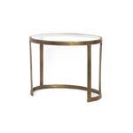 Featuring Calder Polished White Marble Nesting Coffee Table by Four Hands at Amethyst Home. Shapely surfaces, designed to slide together or apart with ease. A raw brass finish lends a lived-in feel to aluminum framing, with one oval-shaped nester topped by polished white marble pairing with a taller, rounded table featuring tempered glass.    Large Table: 38. Amethyst Home provides interior design, new home construction design consulting, vintage area rugs, and lighting in the Portland metro area.