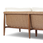 Bring home vintage inspiration. The sling shape of this outdoor sofa features a reimagined bucket seat in woven faux hyacinth, finished with rounded tapered legs that mirror the shape of the frame. Cover or store indoors during inclement weather and when not in use Amethyst Home provides interior design, new home construction design consulting, vintage area rugs, and lighting in the Boston metro area.