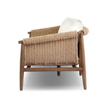Bring home vintage inspiration. The sling shape of this outdoor sofa features a reimagined bucket seat in woven faux hyacinth, finished with rounded tapered legs that mirror the shape of the frame. Cover or store indoors during inclement weather and when not in use Amethyst Home provides interior design, new home construction design consulting, vintage area rugs, and lighting in the Charlotte metro area.
