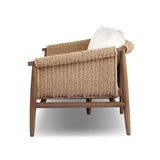 Bring home vintage inspiration. The sling shape of this outdoor sofa features a reimagined bucket seat in woven faux hyacinth, finished with rounded tapered legs that mirror the shape of the frame. Cover or store indoors during inclement weather and when not in use Amethyst Home provides interior design, new home construction design consulting, vintage area rugs, and lighting in the Charlotte metro area.
