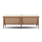 Bring home vintage inspiration. The sling shape of this outdoor sofa features a reimagined bucket seat in woven faux hyacinth, finished with rounded tapered legs that mirror the shape of the frame. Cover or store indoors during inclement weather and when not in use Amethyst Home provides interior design, new home construction design consulting, vintage area rugs, and lighting in the Newport Beach metro area.