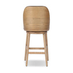 Solid ash wood forms a subtly curved back on this everyday counter stool. Its open frame and seat features rounded edges for 