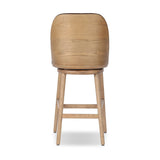 Solid ash wood forms a subtly curved back on this everyday counter stool. Its open frame and seat features rounded edges for 