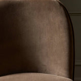 Solid ash wood forms a subtly curved back on this everyday counter stool. Its open frame and seat features rounded edges for 