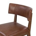 Featuring Cardell Sonoma Chestnut Dining Chair by Four Hands at Amethyst Home. Tan-finished parawood forms a curved barrel back for a shapely take on everyday dining, with top-grain leather seating that moves between styles with ease.Overall Dimensions: 24.00"w x 22.50"d x 32.50"hWeight : 16.53 lbsMaterials : Top Grain Leather, Solid Nettlewood. Amethyst Home provides interior design, new home construction design consulting, vintage area rugs, and lighting in the Houston metro area.