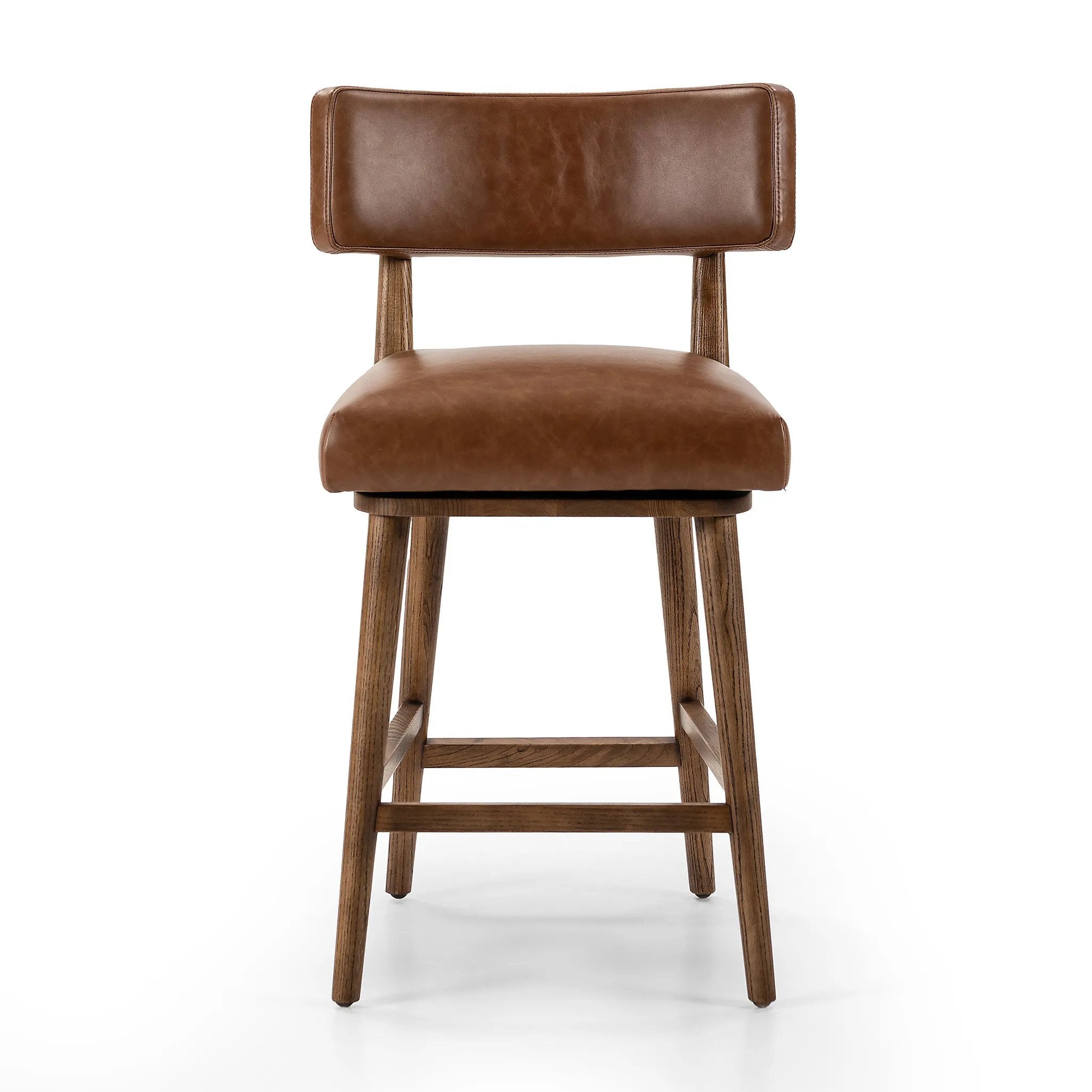 This reimagined classic pairs a barrel back frame of solid nettlewood with top-grain leather in a rich chestnut. A 180-degree swivel with return memory tops off the piece with fresh functionality Amethyst Home provides interior design, new home construction design consulting, vintage area rugs, and lighting in the Winter Garden metro area.