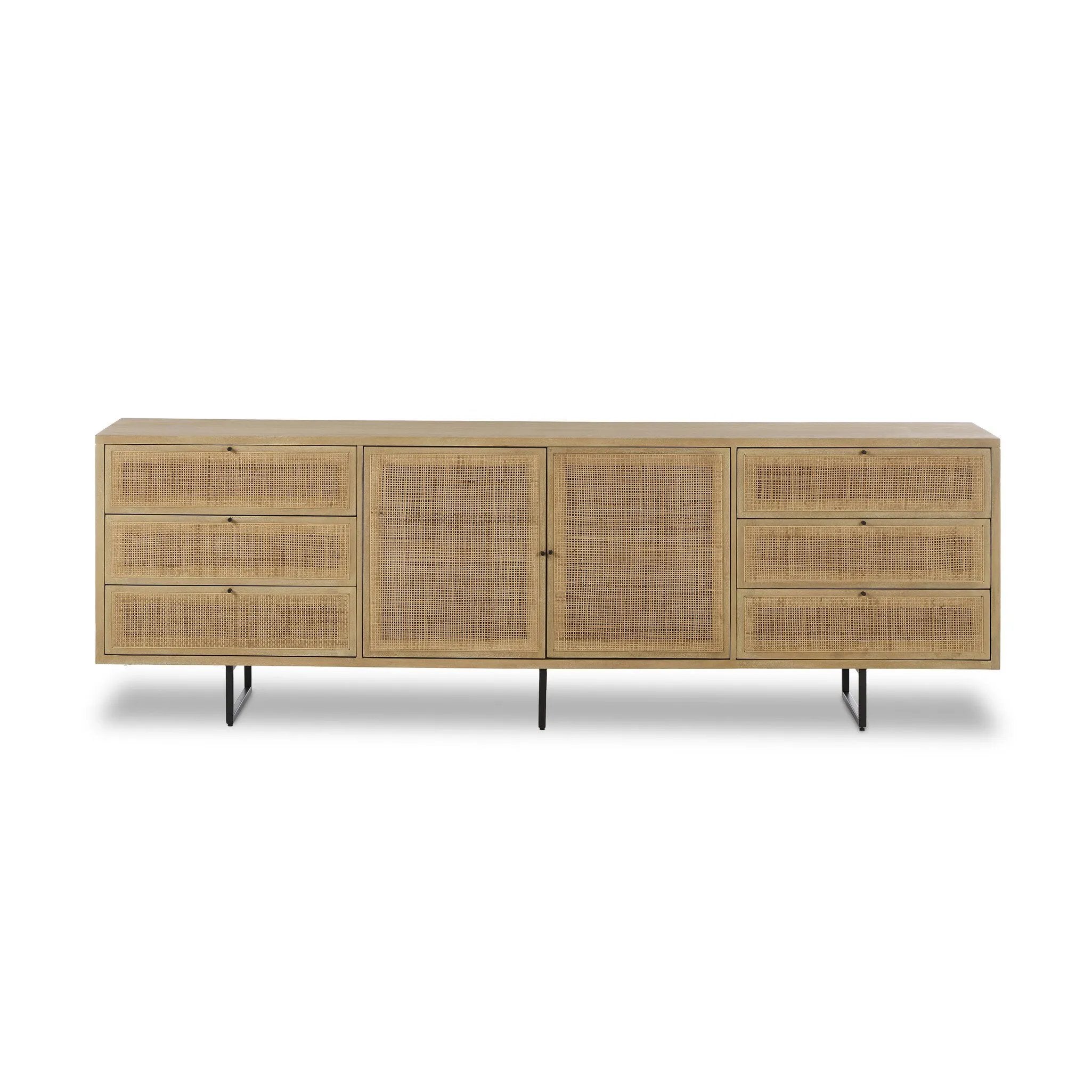 Midcentury-inspired style with an organic twist. Surrounded by mango casing, light cane weaves for a fresh, natural look. Finished off with angular gunmetal-finished iron legs. Plenty of interior storage for your favorite table linens and dinnerware Amethyst Home provides interior design, new home construction design consulting, vintage area rugs, and lighting in the Dallas metro area.